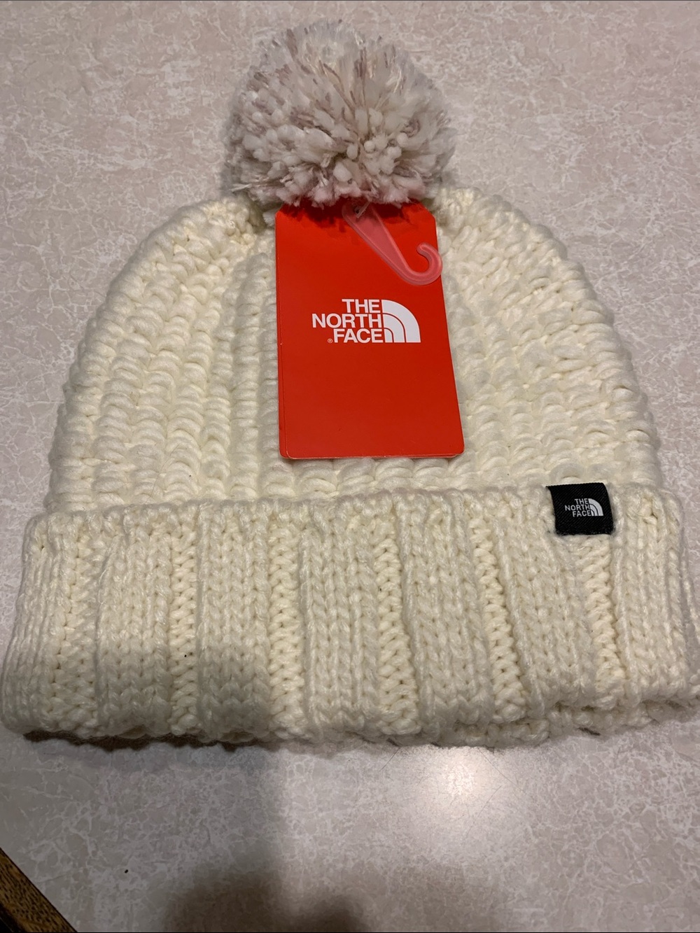The North FaceCream Pom-Pom Knit Beanie Size O/S